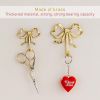 2-pack multi-purpose brass screw hooks with bow design, vintage style, practical gold wall hooks, suitable for bathrooms and bedrooms